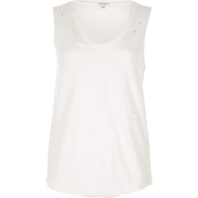 Cream distressed tank top with cut out detail